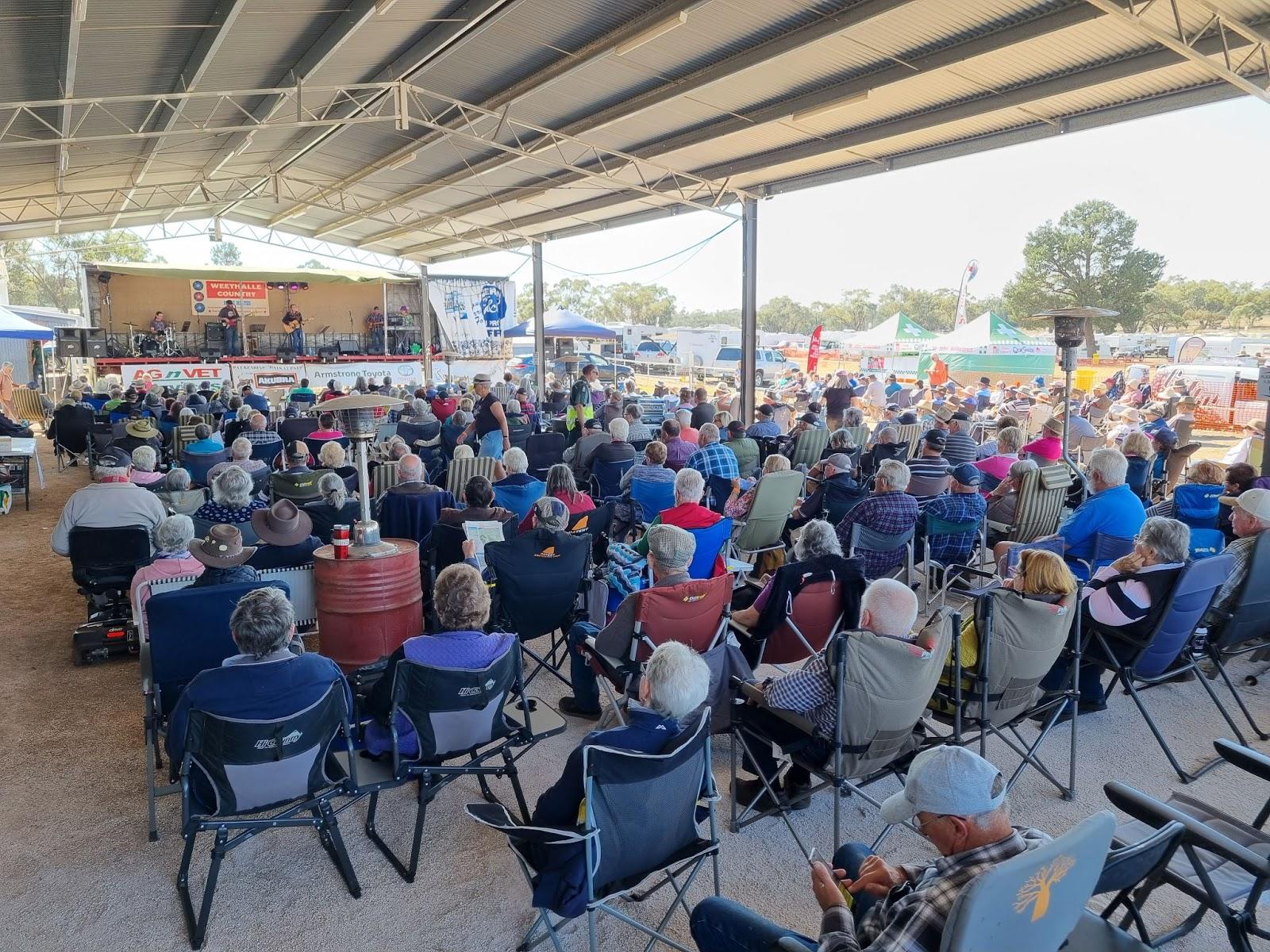 Spectators in Bland Shire New South Wales take in the sights and sounds of the Weethalle Country Music Muster