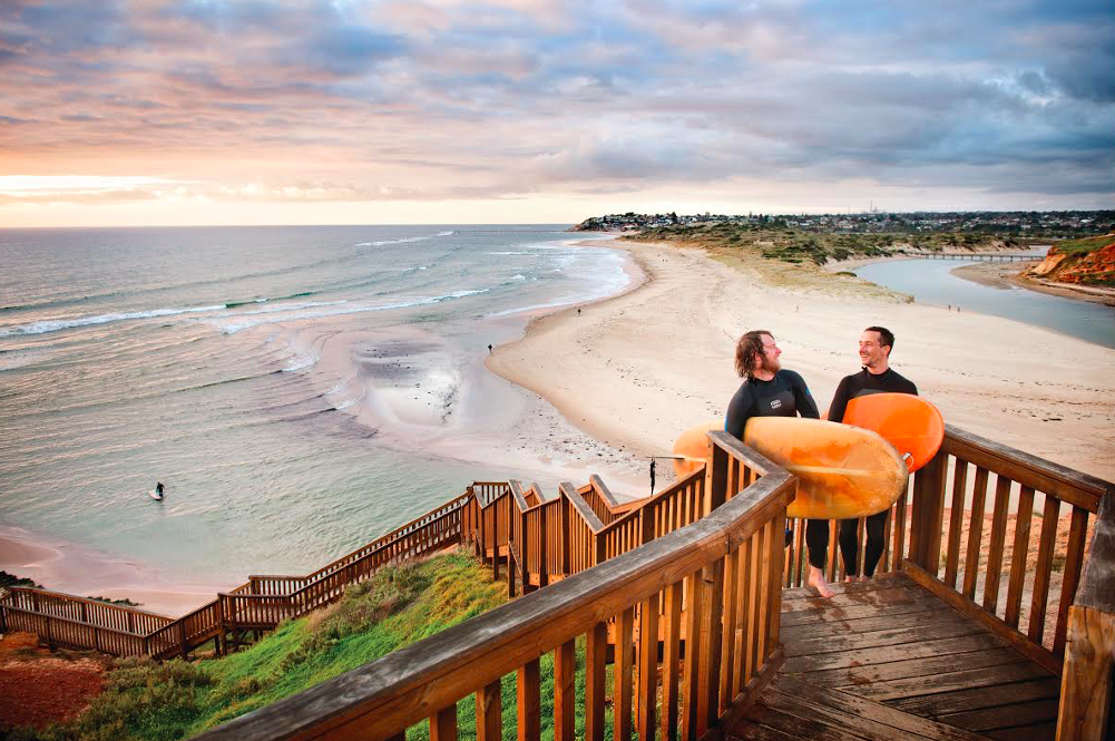 Surfers at the stunning South Port beach in Onkaparinga Council South Australia