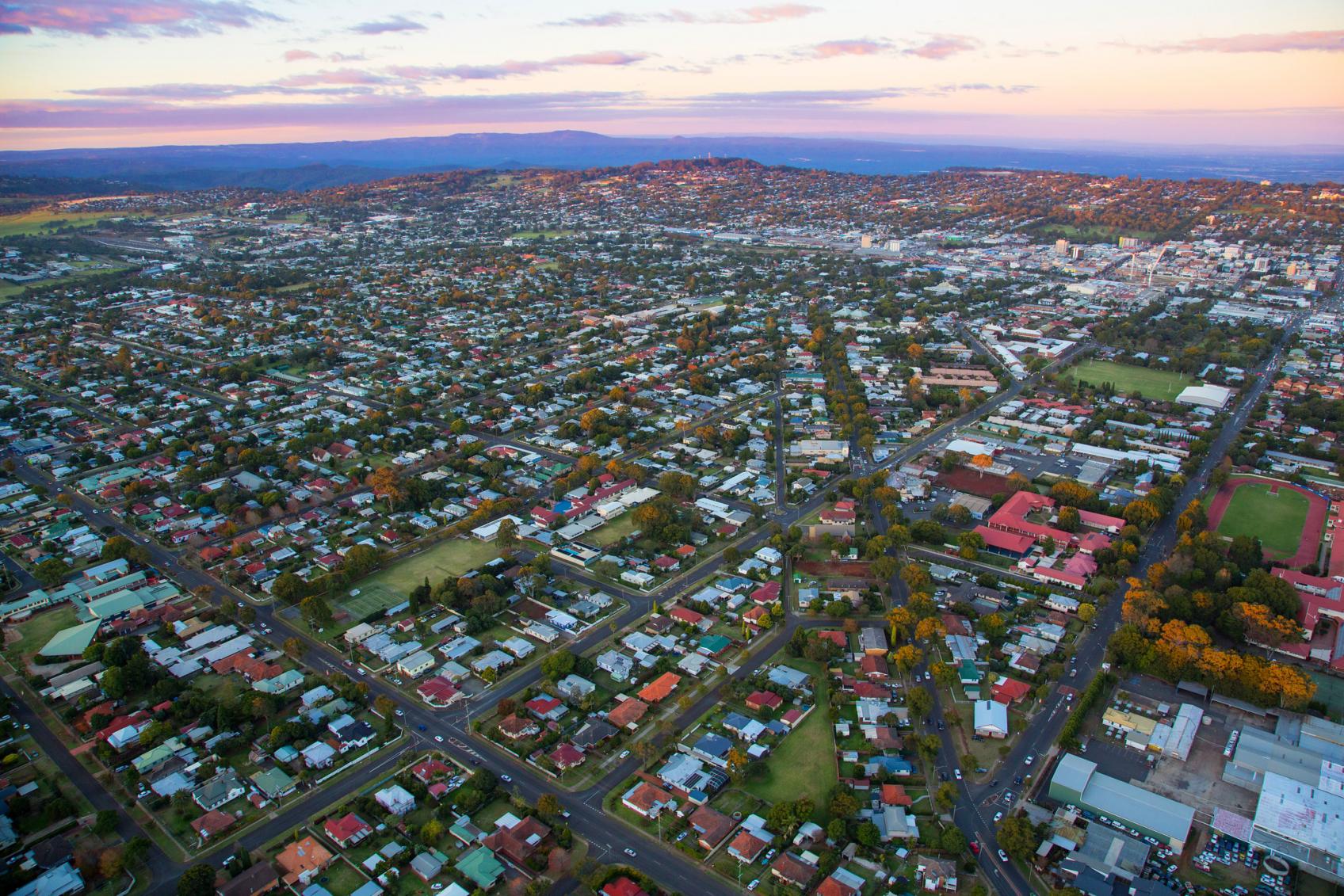 An aerial image of Toowoomba on the Darling Downs South West Queensland with a soft pink sunset