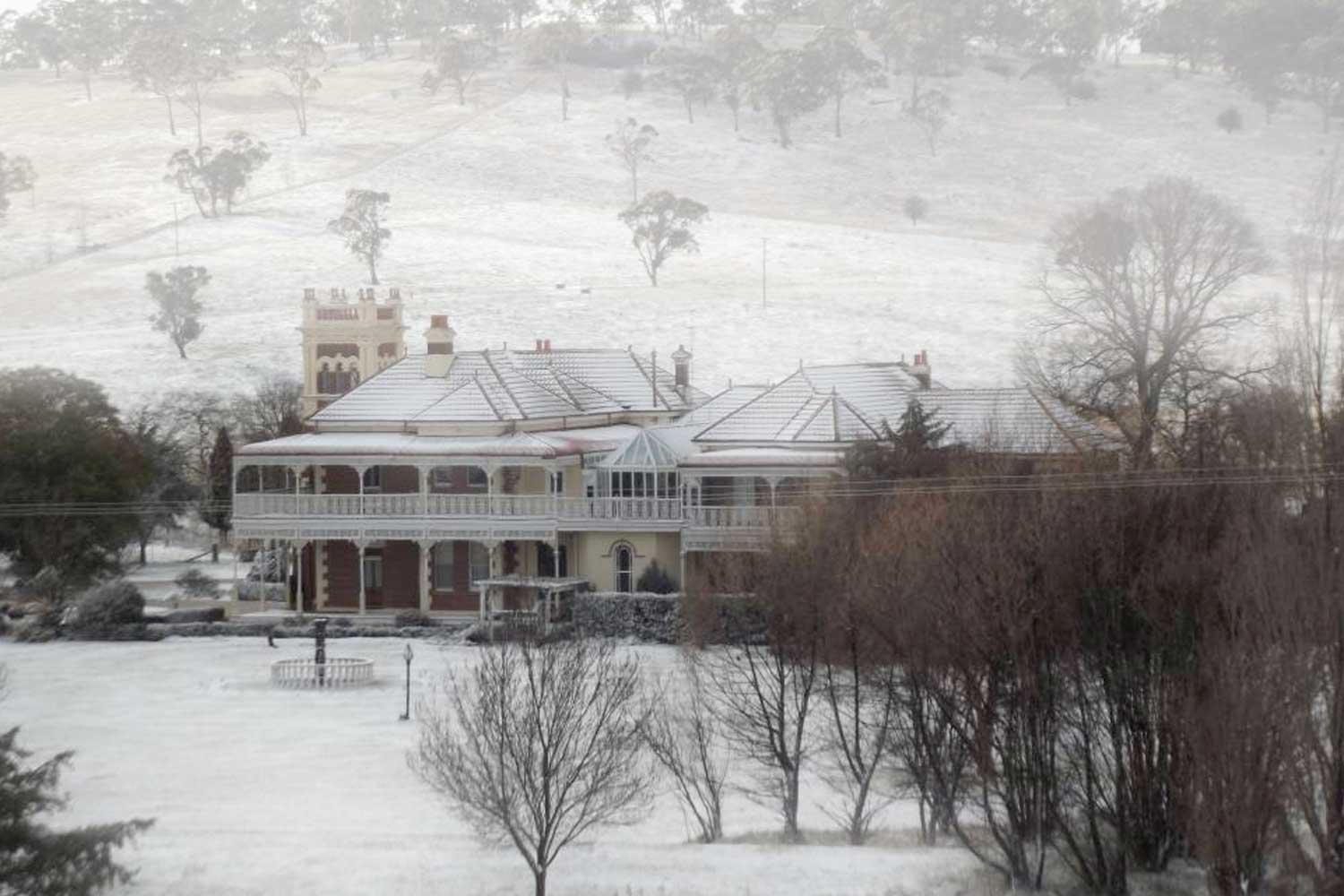 Langford House in Walcha surrounded by snowy grounds