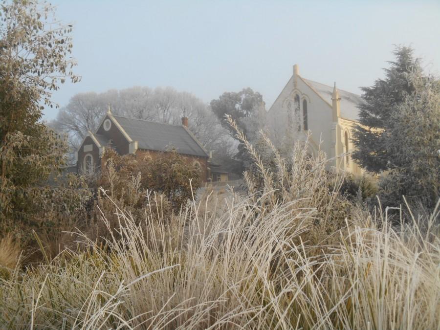 One of Walcha's many churches surrounded by frost touched gardens