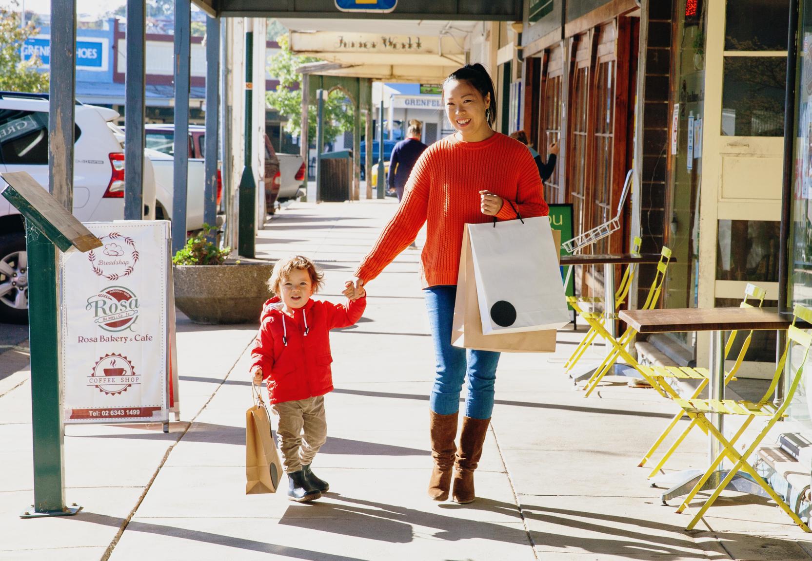 Mother and son shop in Grenfell Weddin Shire NSW on a bright and sunny day