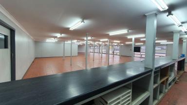 Showrooms/Bulky Goods For Lease - QLD - Harristown - 4350 - High Exposure Retail Goods Site with a Wide Street Frontage and Extra Storage Area Upstairs  (Image 2)