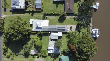 House For Sale - NSW - Brushgrove - 2460 - WATERFRONT LIVING WITH AN INCOME – BOATS INCLUDED!  (Image 2)