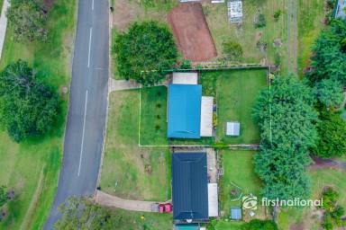 House Sold - QLD - Gin Gin - 4671 - TIDY 3 BEDROOM BRICK HOME STONES THROW FROM GIN GIN TOWN CENTRE  (Image 2)
