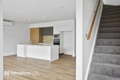 Townhouse Leased - TAS - Kingston - 7050 - Modern Luxury and Inviting Comfort  (Image 2)