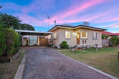 House Sold - QLD - Eastern Heights - 4305 - CHARMING COTTAGE WITHIN AN ENCHANTED GARDEN: A SYMPHONY OF NATURE'S BEAUTY  (Image 2)