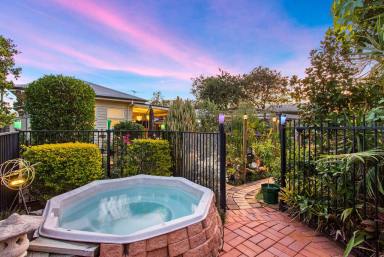 House Sold - QLD - Eastern Heights - 4305 - CHARMING COTTAGE WITHIN AN ENCHANTED GARDEN: A SYMPHONY OF NATURE'S BEAUTY  (Image 2)