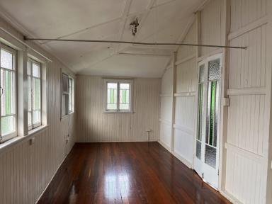 House Leased - QLD - Berserker - 4701 - Prepare to be charmed by this cozy cottage, snuggled in the perfect spot for easy access to all your heart&apos;s desires!  (Image 2)