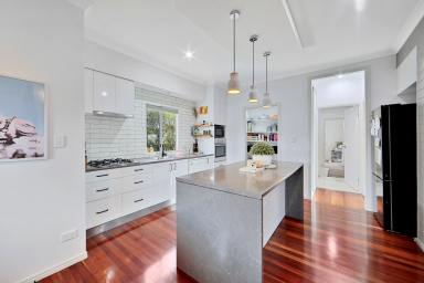 House Sold - QLD - Walkervale - 4670 - TASTEFULLY RENOVATED WITH TWO BATHROOMS AND AIR-CONDITIONING!  (Image 2)