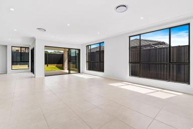 House Sold - NSW - Austral - 2179 - Luxury Living Redefined in This Brand-New Five-Bedroom Residence!  (Image 2)