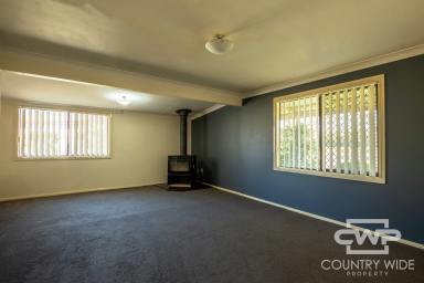 House For Sale - NSW - Glen Innes - 2370 - Charming 3-Bedroom House with Ample Parking  (Image 2)