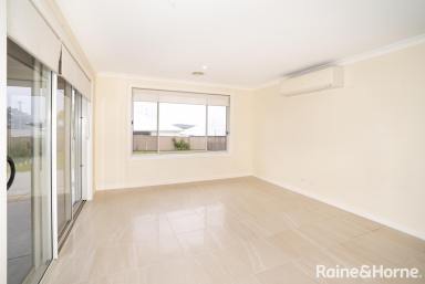 House Leased - NSW - Boorooma - 2650 - Family-friendly home // Lawn maintenance included (Image 2)