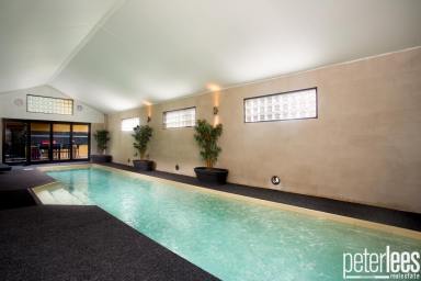 House For Sale - TAS - Blackstone Heights - 7250 - Breathtaking Water Views from the Two Residences 
A True Blackstone Gem  (Image 2)