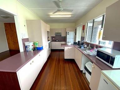 House For Sale - QLD - Koongal - 4701 - Charming 4-Bedroom Home with Ample Space and Reliable Tenants  (Image 2)