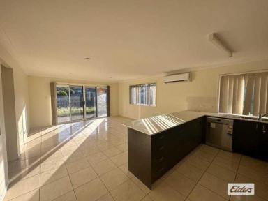 House For Lease - QLD - Brassall - 4305 - **For Rent: Spacious 4-Bedroom Brick Home with Outdoor Entertainment Area**  (Image 2)