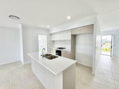 House Leased - NSW - Old Bar - 2430 - Stunning brand new four bedroom home in Emerald Fields  (Image 2)