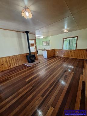 House For Lease - QLD - Nanango - 4615 - This 3-bedroom home sits on a half-acre block and offers a great opportunity for those needing outside space and storage  (Image 2)