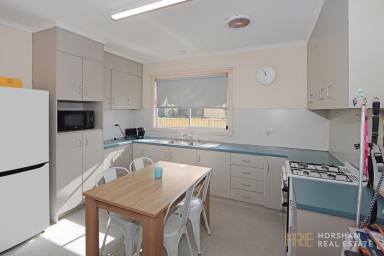 House For Sale - VIC - Horsham - 3400 - Spacious 3-Bedroom Home with Modern Kitchen, Shed & Bonus Bungalow  (Image 2)