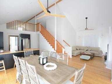 House For Lease - NSW - Old Bar - 2430 - MODERN COASTAL LIVING – STYLISH 3-BEDROOM HOME WITH LOFT & OCEAN GlLIMPSES  (Image 2)