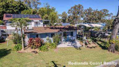 House Sold - QLD - Lamb Island - 4184 - Beautifully Presented Home with Sea Views in a Prime Location  (Image 2)