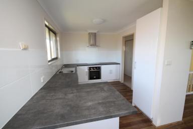 House For Sale - NSW - Inverell - 2360 - Spacious Two-Storey Brick Home with Scenic Views (Image 2)