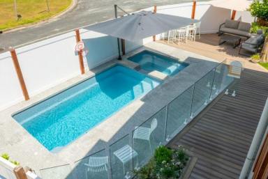 House For Sale - QLD - Point Lookout - 4183 - Renovated Dual-Living Coastal home with Pool, Spa & Income - Close to Beaches & Cafes (Image 2)