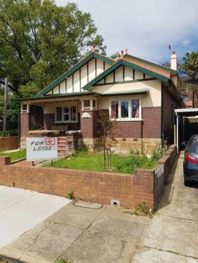 House Leased - NSW - Ashfield - 2131 - Modern Ashfield Family Home: Renovated Kitchen, Side Access & 15-Minute Stroll to Station  (Image 2)