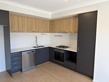 Townhouse Sold - VIC - Clyde North - 3978 - Low maintenance, no strata/body corp townhouse — Perfect first home, downsizing or investment  (Image 2)