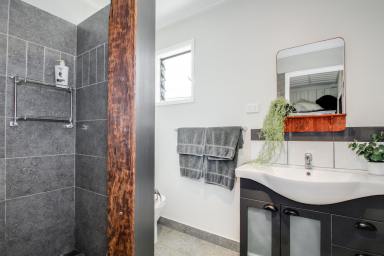 House For Sale - QLD - Macleay Island - 4184 - Tastefully Finished Island Retreat – Elevated, Near-New & Move-In Ready! - Veggie gardens fully established  (Image 2)