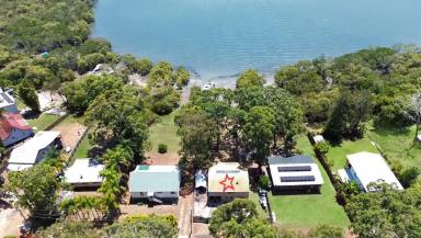House For Sale - QLD - Macleay Island - 4184 - Absolute Waterfront Living – Launch Your Boat from Your Backyard (Image 2)