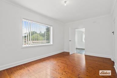 House For Lease - NSW - Port Kembla - 2505 - Neat & Tidy Family Home | Split-Level Living in Prime Location  (Image 2)