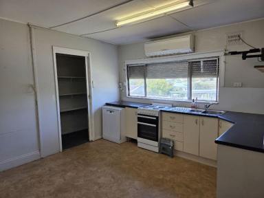 House Auction - NSW - Muswellbrook - 2333 - IT WILL DO UP! AND YOU'LL COMMAND A CENTRAL TOWN LOCATION IN THIS 3-4 B/R W/BOARD HOME WITH BACK YARD ACCESS.  (Image 2)