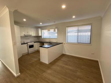 House For Lease - NSW - Glenfield Park - 2650 - Spacious Family Home in Convenient Location  (Image 2)