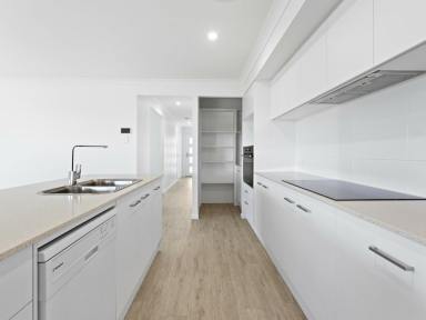 House For Sale - NSW - Old Bar - 2430 - DECEPTIVELY LARGE HOME IN QUIET STREET  (Image 2)