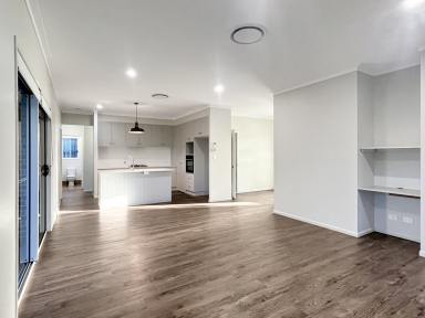 House For Lease - QLD - South Toowoomba - 4350 - Nothing has been overlooked with this impressive home, this home is ideal for professionals or families alike. (Image 2)