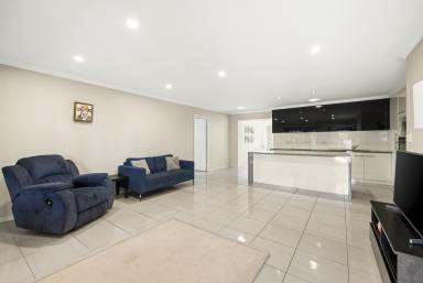 House For Sale - QLD - Darling Heights - 4350 - Spacious Family Living with Multiple Living Areas & Generous Backyard  (Image 2)