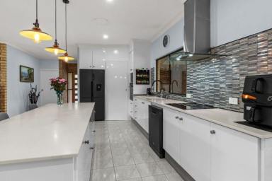 House For Sale - QLD - Innisfail Estate - 4860 - SPACIOUS FAMILY LIVING ON A GRAND 1,345m² RESIDENTIAL BLOCK  (Image 2)