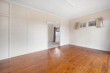 House Leased - QLD - Wilsonton - 4350 - Perfectly Positioned 3-Bedroom Home Near Shops, Schools & Parks  (Image 2)