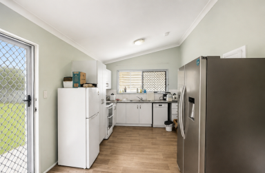 House For Sale - QLD - Koongal - 4701 - Take notice of this hidden gem, offering a modern interior and an impressive range of features designed for comfortable, low-maintenance living.  (Image 2)