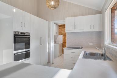 Unit For Lease - QLD - Newtown - 4350 - Stylish 2-Bedroom Townhouse with Private Courtyard in Prime Location  (Image 2)