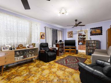 House For Sale - QLD - Wilsonton - 4350 - Well-Presented 1970s Home with Beautiful Gardens & Exceptional Convenience (Image 2)