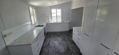 House For Sale - QLD - Ingham - 4850 - FLEXIBLE TWO-LEVEL LIVING WITH EXTENSIVE STORAGE IN INGHAM!  (Image 2)